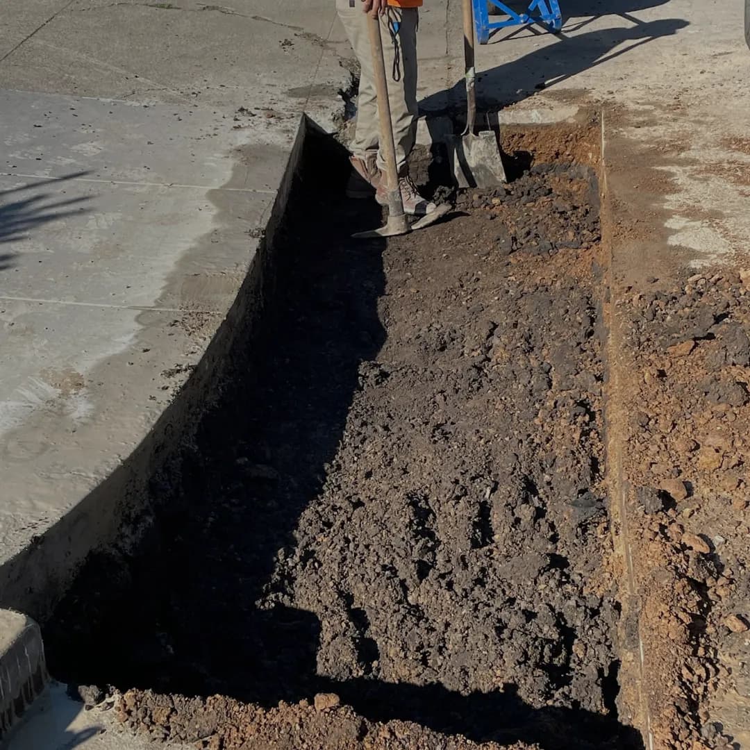 Beautiful paver driveway with herringbone pattern by TP Pavers