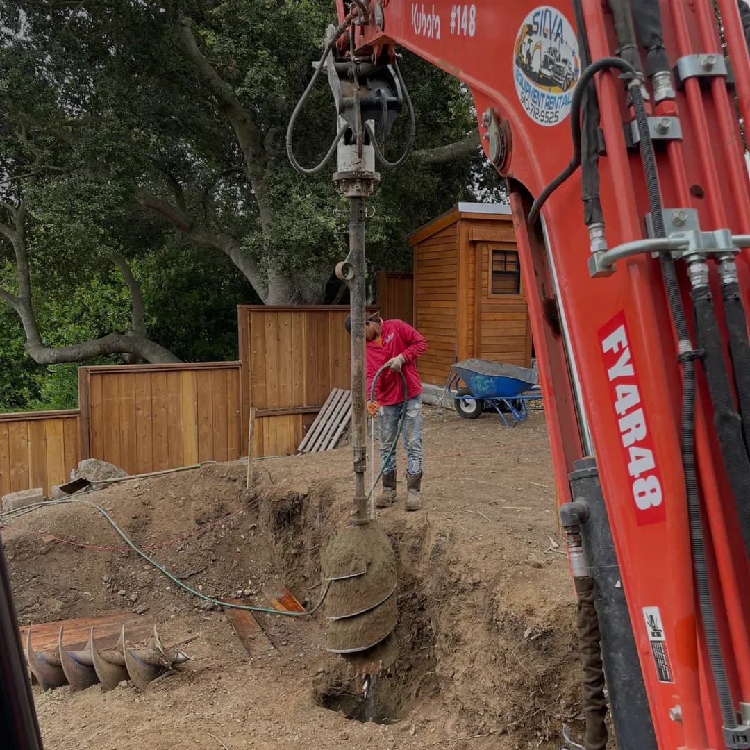 Paver patio combined with synthetic turf in California backyard