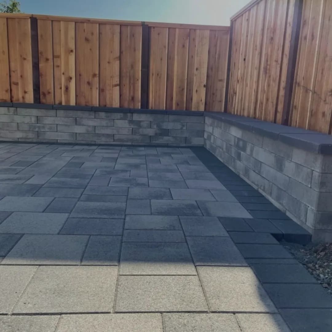 Retaining wall along driveway installation